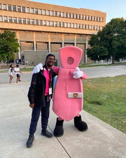 Pinky, the UWaterloo Math Faculty mascot, posing with Sai